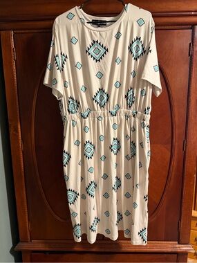 Rowdy Crowd Cream Tunic with Turquoise Aztec Print